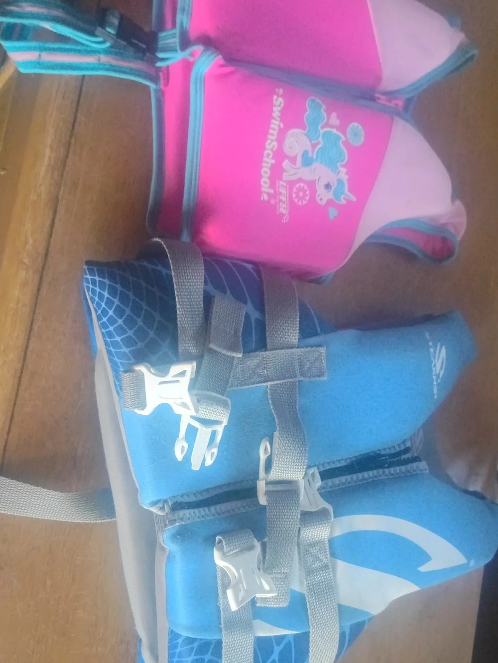 Kids Blue Swim Float Vest and Pink Swim Trainer Set